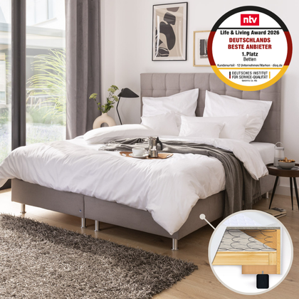 Wohnliches Schlafzimmer mit Hotelbett