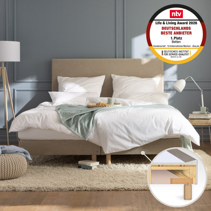 Wohnliches Schlafzimmer mit Hotelbett